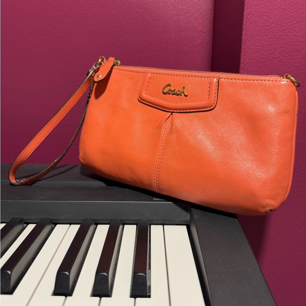 Coach tangerine/coral orange large wristlet purse!